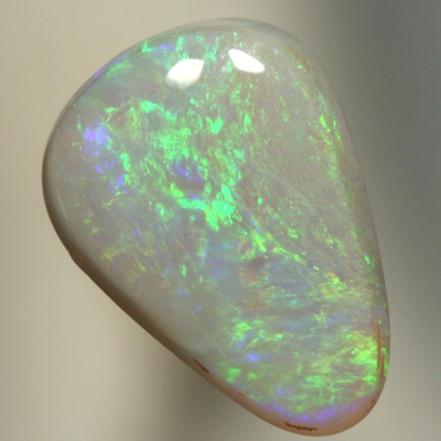 SOLID SEMI BLACK OPAL Greens and a touch of orange sparkle constantly
